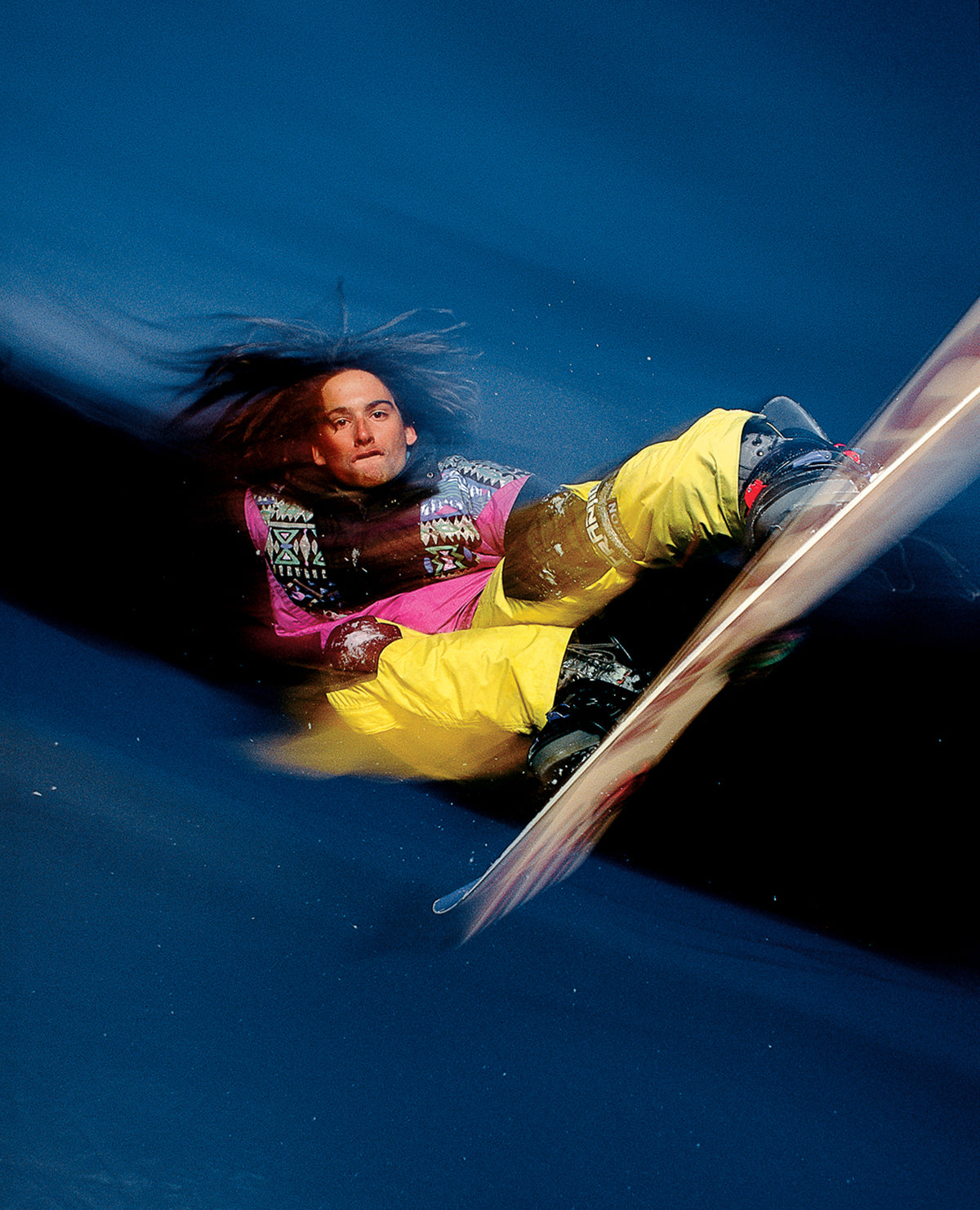 Rider Jess Brushie mid-air on snow