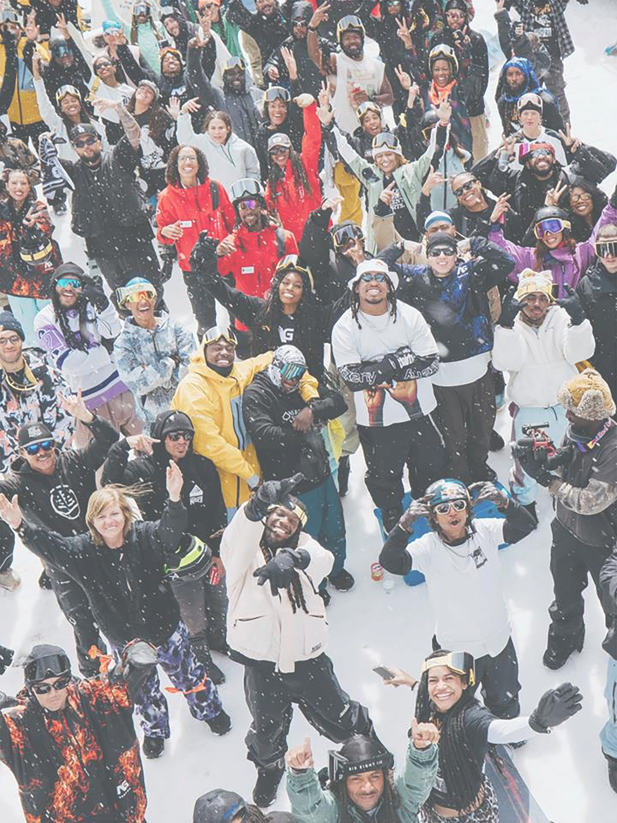 Group of people in winter clothing on a snowy slope