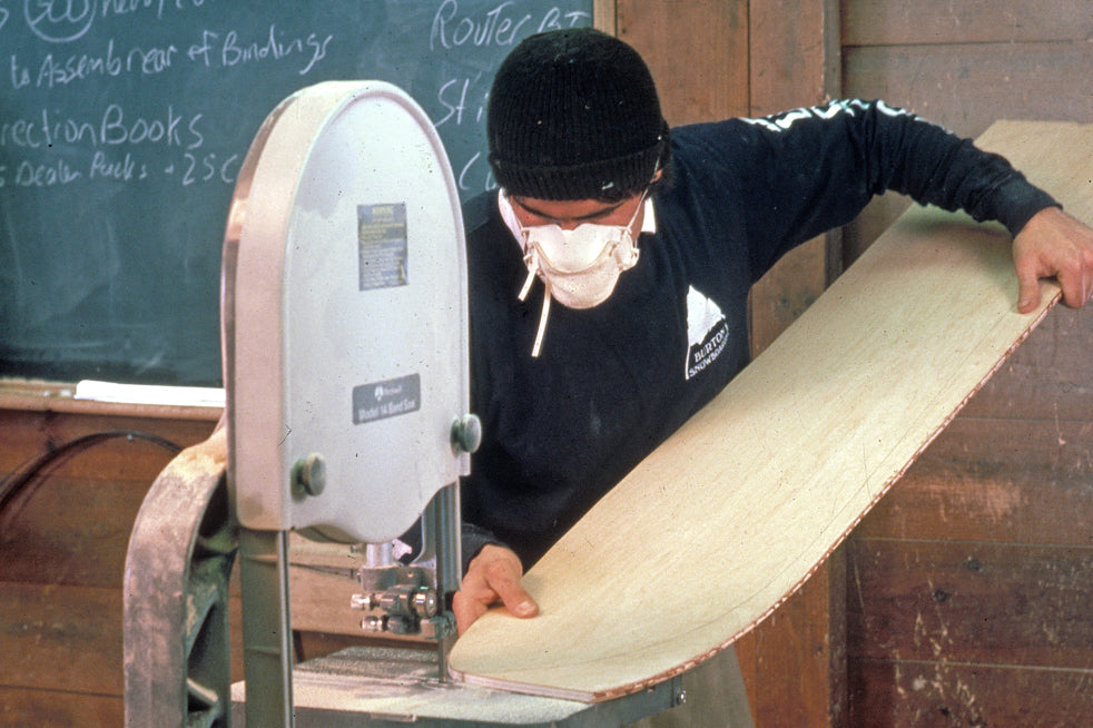 Jake in the shop, shaping an early Burton board 