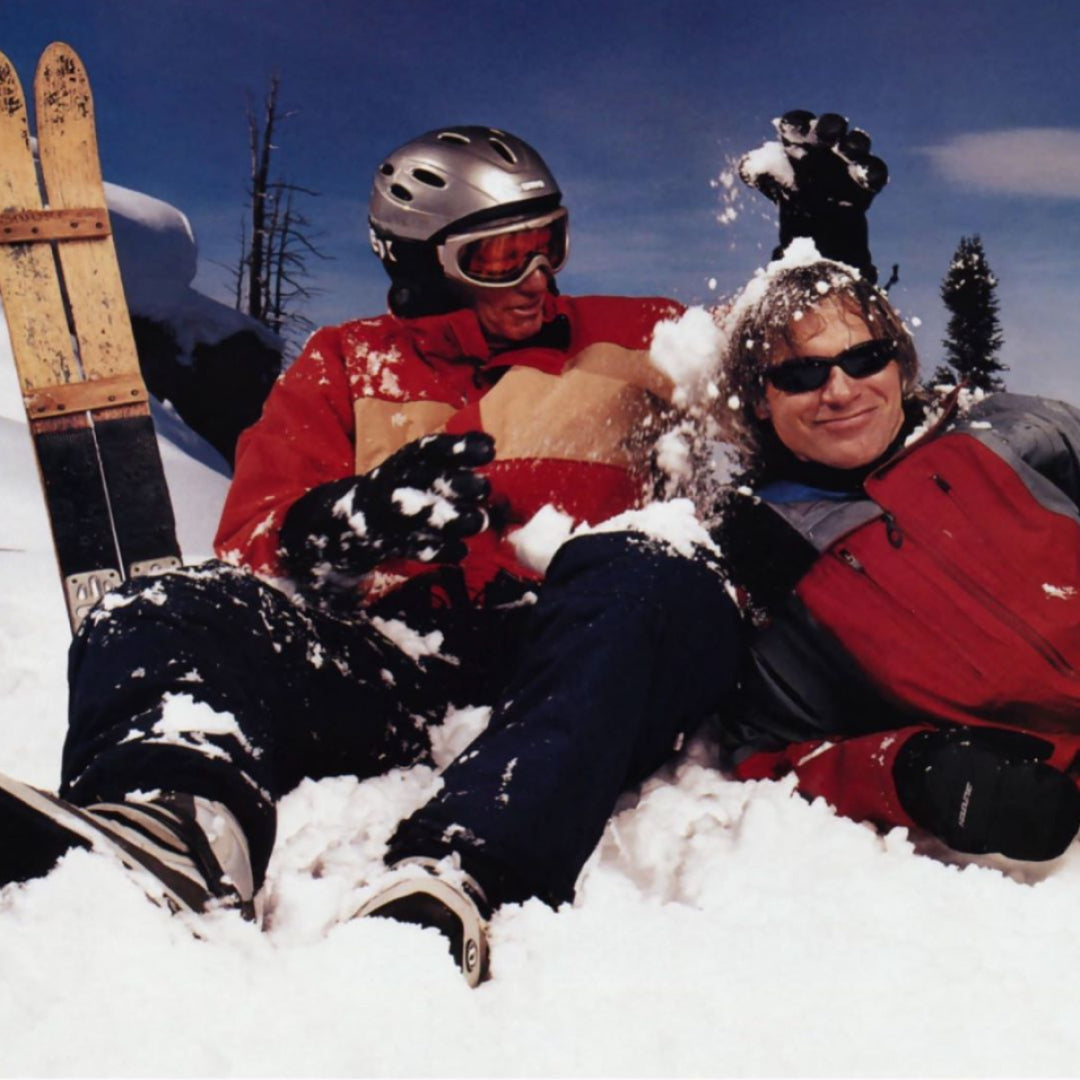 Jake poses with Sherman Poppen, who is dumping snow on his head