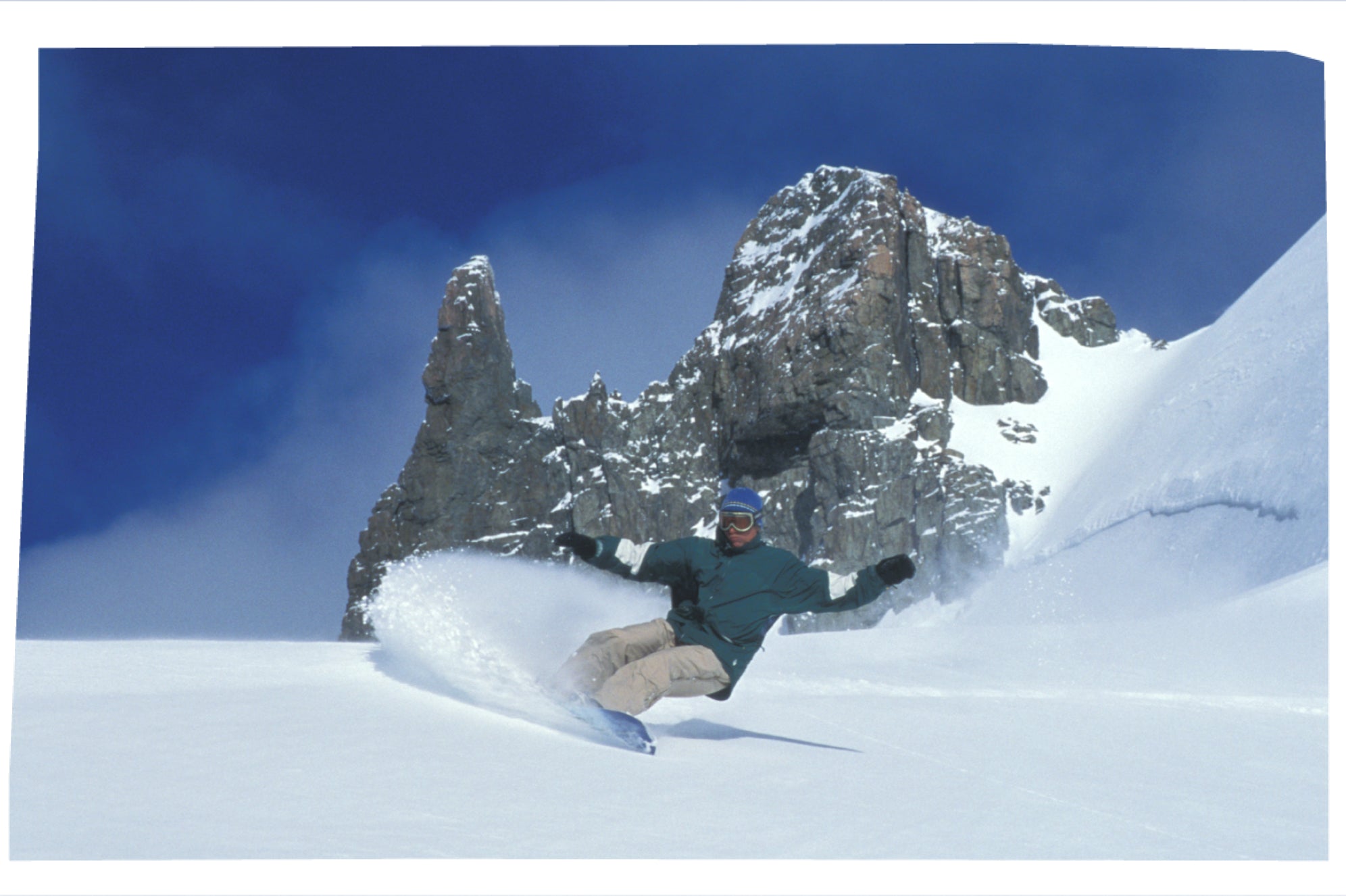 throwback photo of person riding powder